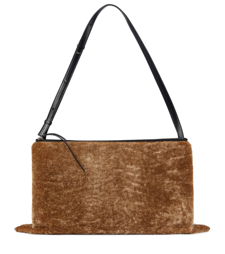 JIL SANDER: Shearling-paneled leather shoulder bag.